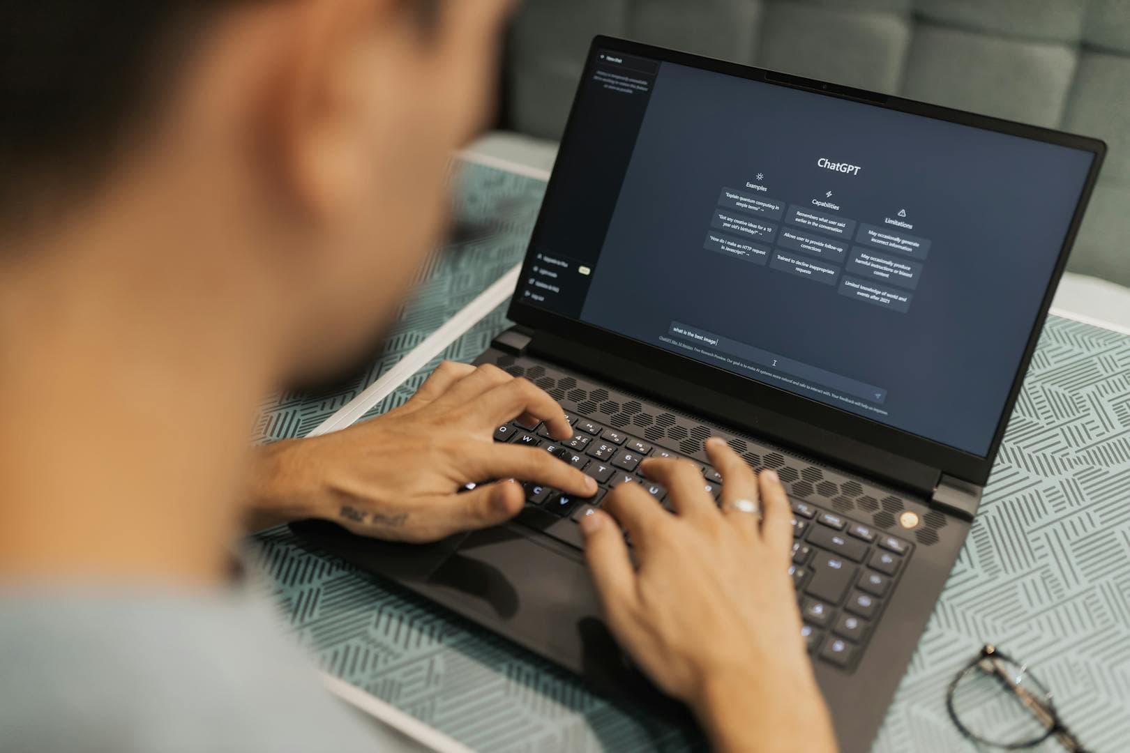 Legal professional using AI-powered software on a laptop to analyze deposition transcripts